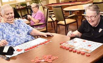 Pegasus Senior Living | Seniors playing Bingo