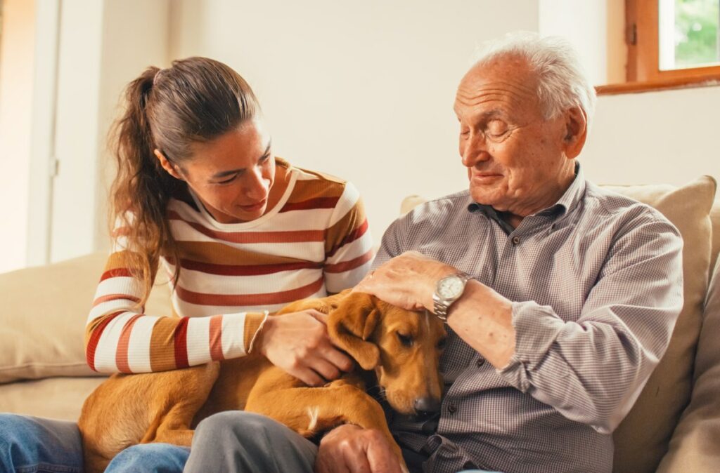 Elk Grove Park | Senior and caregiver petting a dog