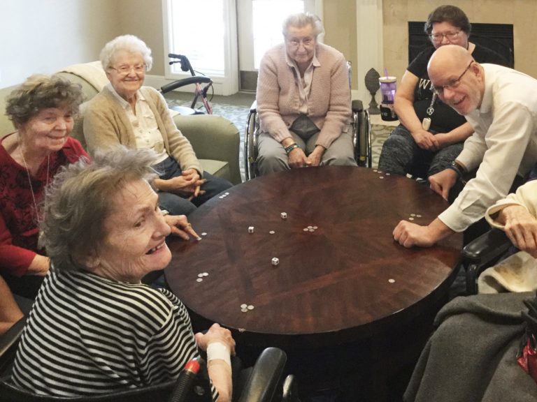 Glenwood Village of Overland Park | Group of seniors playing game