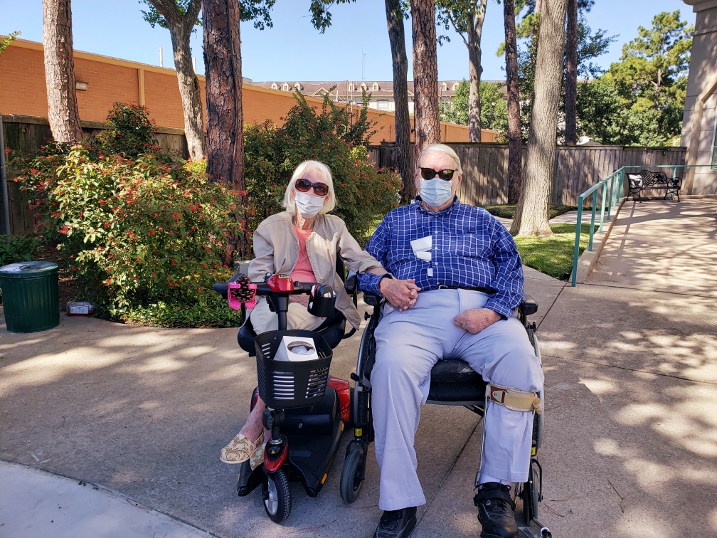 Pegasus Senior Living | Senior couple sitting outdoors