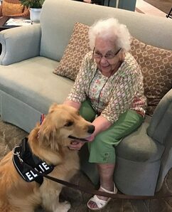 Magnolia Place of Roswell | Resident with therapy dog