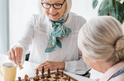 The Havens at Antelope Valley | Senior women playing chess